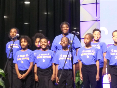 Students singing the National Anthem